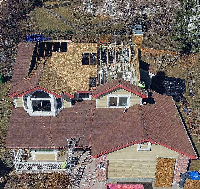 New sheathing going on over the rebuilt roof structure
