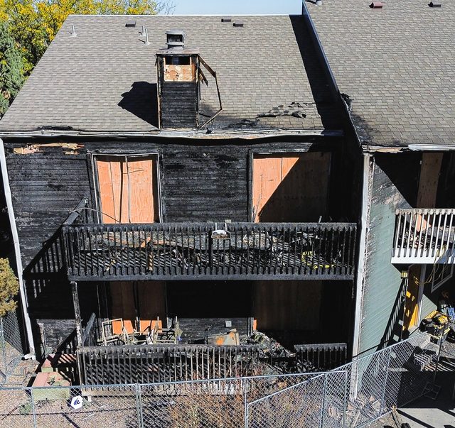 Wider view of the damaged block and the stair access alongside