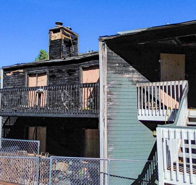 Damaged section beside an untouched neighbouring unit